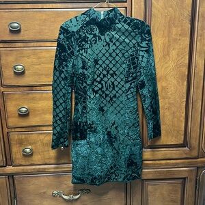Velvet green long sleeved mini dress